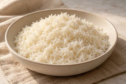 Plain white basmati rice mounded in a ceramic bowl, AI-generated illustration.